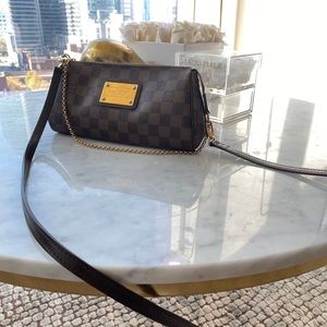 Authentic Louis Vuitton Damien Eva PM clutch